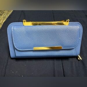Blue and gold crossover bag